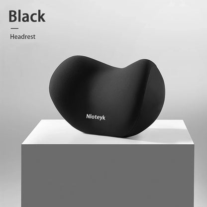 Black memory foam neck pillow for a car headrest